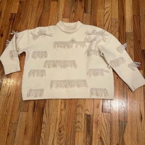 Mr. Larkin cream fringe oversized pullover sweater
